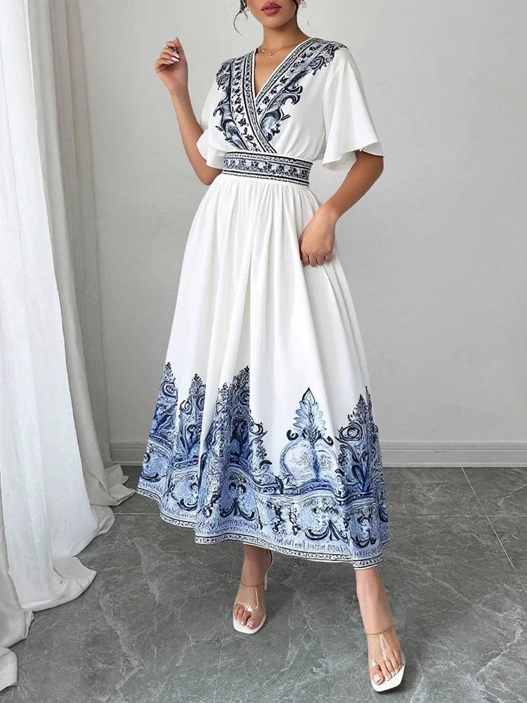 Elegant White Summer Midi Dress – Blue Embroidery & A-Line Fit by Rafiah