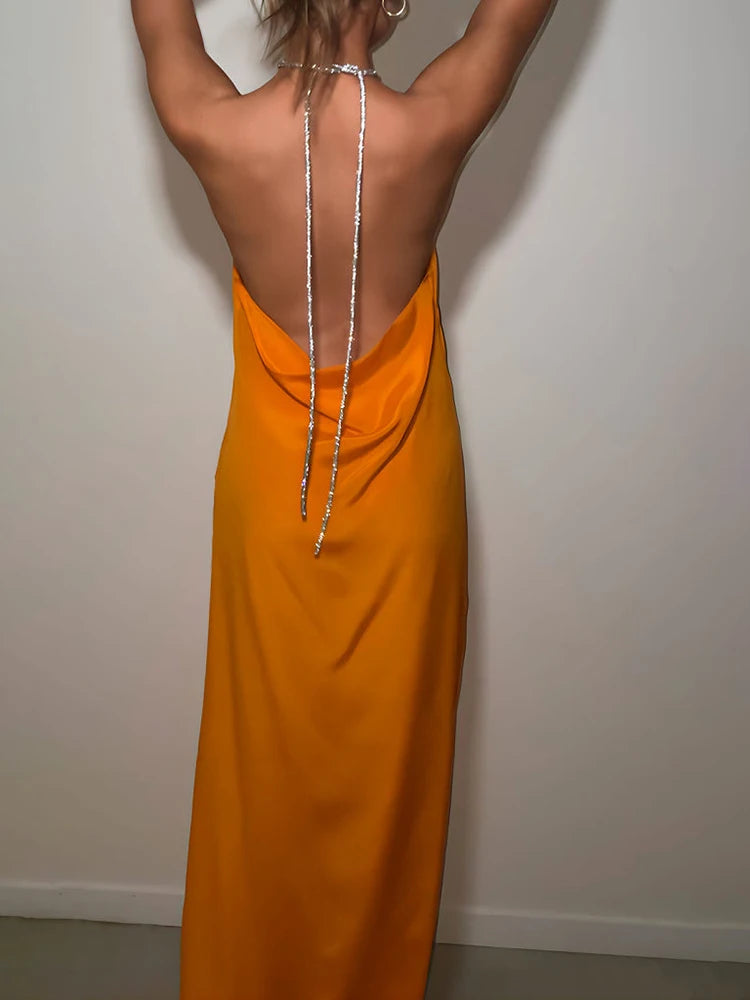 Summer Seduction: Pink Chain Halter Slit Maxi Dress