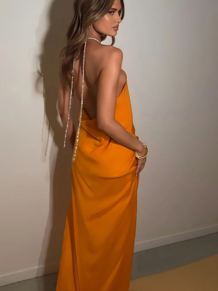 Summer Seduction: Pink Chain Halter Slit Maxi Dress