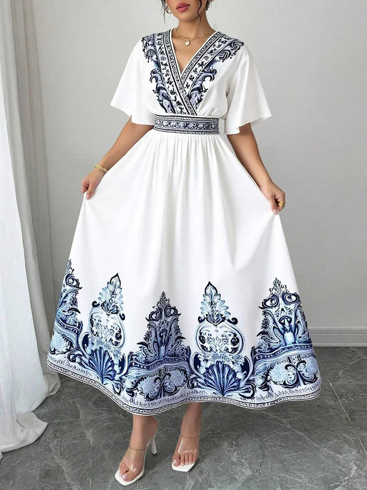 Elegant White Summer Midi Dress – Blue Embroidery & A-Line Fit by Rafiah