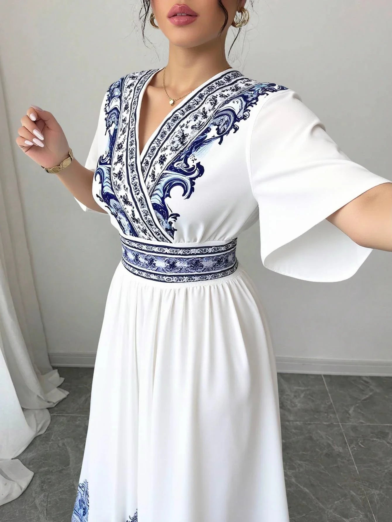 Elegant White Summer Midi Dress – Blue Embroidery & A-Line Fit by Rafiah