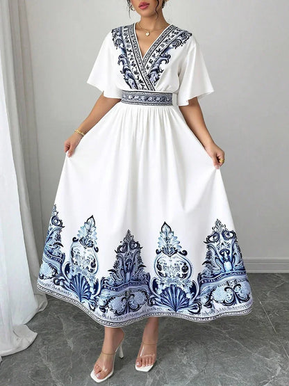 Elegant White Summer Midi Dress – Blue Embroidery & A-Line Fit by Rafiah