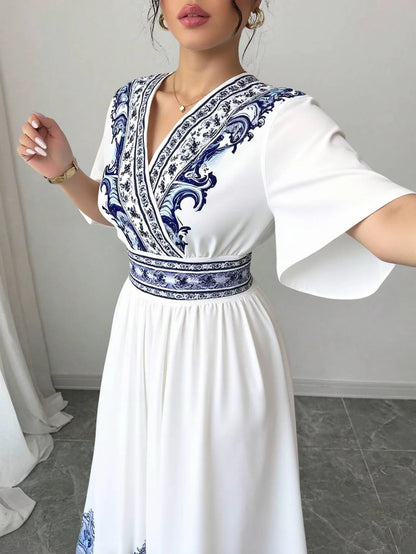 Elegant White Summer Midi Dress – Blue Embroidery & A-Line Fit by Rafiah